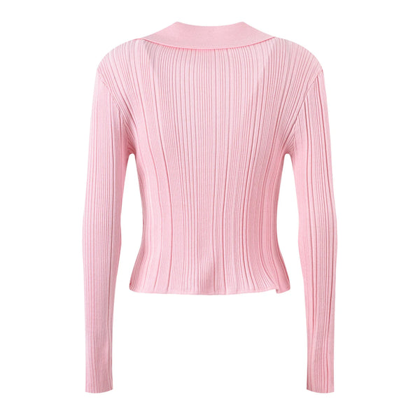 Pink ribbed long-sleeve top on a white background