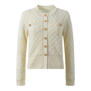 Cream-colored knitted cardigan with button details on a white background