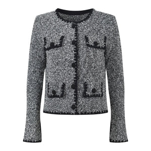 Black and white patterned cardigan on a white background