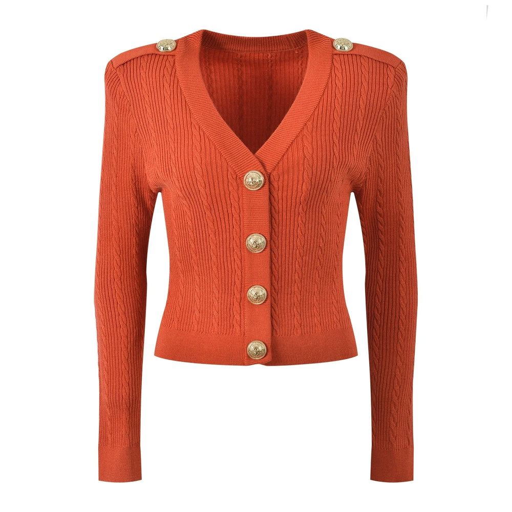 Orange ribbed sweater with gold buttons on a white background