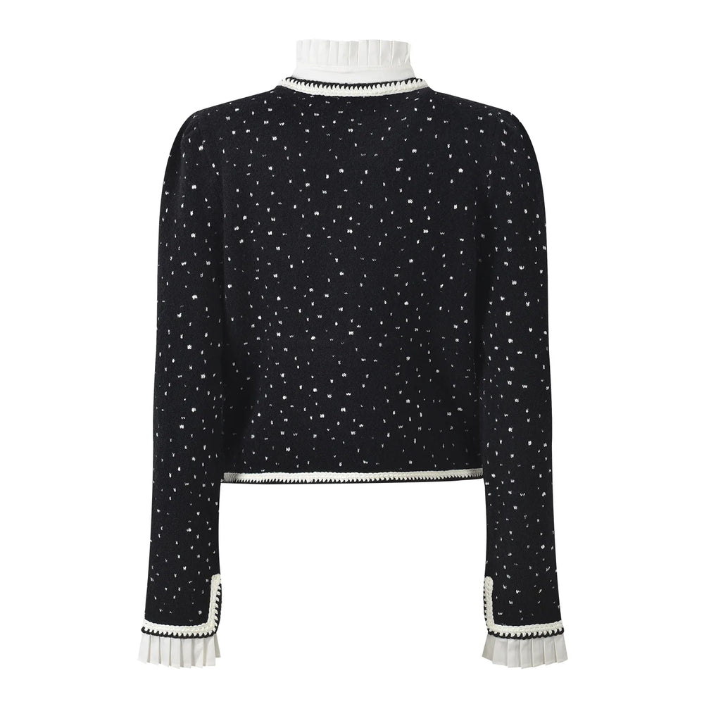 Black textured jacket with white trim on a white background
