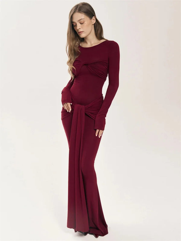 Become a trendsetter with our Oslo Maxi Dress! This bold and adventurous dress features a unique patchwork twist design, flattering slim fit, and long sleeves for a 