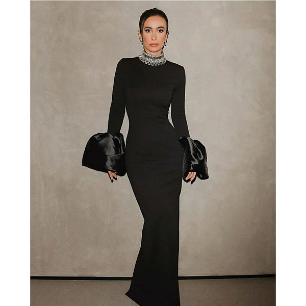This black bandage dress features elegant flare sleeves and sparkling diamonds, adding a touch of luxury to any evening party or cocktail event. Designed for the sop