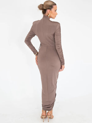 Experience elegance and luxury in our Valerie Long Sleeve Maxi Dress. Designed for the sophisticated woman, this dress features a drawstring turtleneck and ruched de