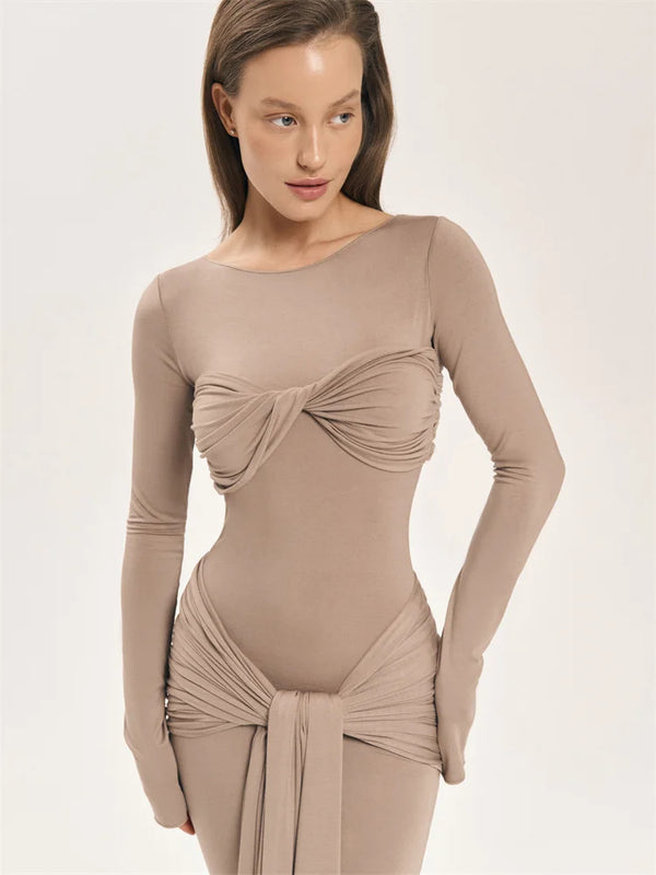 Become a trendsetter with our Oslo Maxi Dress! This bold and adventurous dress features a unique patchwork twist design, flattering slim fit, and long sleeves for a 