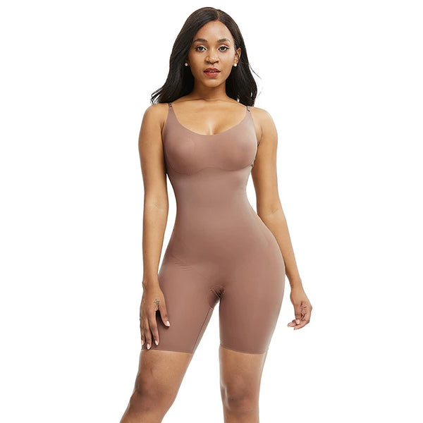 Woman wearing a brown bodysuit against a white background